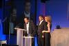 Daniel Hart addresses the audience on receiving the company's award