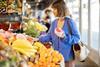 Lady buying bananas