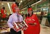 Barry Gramlick, store manager of Harlow Asda, with Tamsyn the Tomato