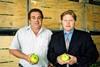 Weald Marketing directors Clive Goatham (left) and Tony Smith holding last season’s Bramley apples