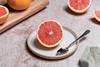 Sunkist grapefruit half on plate