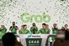 1 Grab Co-Founders ring the Opening Bell in Singapore as Grab goes public on Nasdaq
