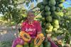 Candy MacLaughlin of Skybury Farms with a papaya