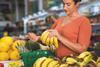 p50-51 pic 2 Generic woman buying bananas