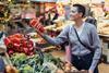 Spanish consumer buying peppers Adobe Stock