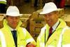 Matt George, general manager, Christian Salvesen (left) and Gerry Mundy, global perishables manager, BA (right) inspect fresh produce arriving in the UK.