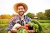 Young farmer organic vegetables basket