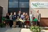 CEO Marcus Meadows-Smith cutting the ribbon at the upgraded AgraQuest R&D complex in Davis, California