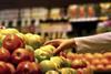 UK apple supermarket hand