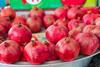 Local Uzbek pomegranates displayed at a market
