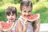 Children eating watermelon Adobe Stock