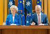 l-r Ursula von de Leyen and Anthony Albanese sign the Australia-EU FTA