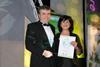 Chris Treble accepts his award from Maria José Sevilla, director of Foods from Spain