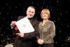 Radoslaw Kozlowski recieves his award from Lynda Armstrong of the BSC SMALL