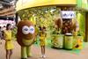 CN HK Zespri Asia Fruit Logistica hostesses giant kiwifruit