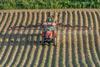 Spraying a potato field pesticide Adobe Stock
