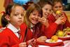 children eating fruit