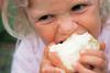 Kid eating apple Italy