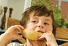 Child eating melon