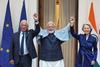 (l-r) President of the European Council António Luís Santos da Costa, Indian Prime Minister Narendra Modi and President of the European Commission Ursula von der Leyen celebrate the free trade agreement
