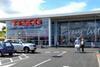 Tesco records "solid" performance