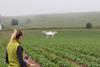 Catriona McLean with drone at SeedSPot farm lo res