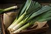 Organic leeks in box Adobe Atock