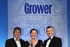 Margie Ribton collecting her award from MorePeople director Guy Moreton and BBC TV sports presenter John Inverdale.