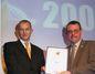 Loadhog sales and marketing manager Simon de Jaeghere (left) receives the Starpack Silver Award