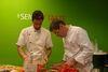 Chef Eyal Shani, right, and his assistant on the ZG stand