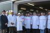 From far left: Robert Oldershaw Jr, MBC account director, David Hodgson, md, Robert Oldershaw Snr, chairman, Mick Stewart, factory manager, and Claire Young, Waitrose prepared buyer, with MBC staff at new facility