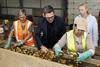 Andy Burnham inspects potatoes at FG Pryor & Son