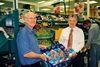 Store manager Derek Browgham (right)  at the Lunsford Park store, with produce assistant Peter Watson