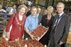 The Lord Mayor, Lady Mayoress, and the Mayor of Waltham Forest sample Spits’ strawberries