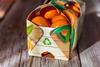 Mandarins in cardboard packaging Adobe