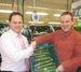 Thanet Earth Cucumber Grower, Addy Breugem and Tesco Broadstairs Extra store manager, Matthew Polson put first tray on shelf