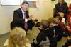 EAP ceo Adrian Barlow teaches chldren about English apples