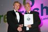 John Holland of JR Holland receives his award for Overall Produce Trader of the Year 2007, from Martin de la Fuente of award sponsor Tesco