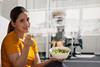 Woman eating grapes