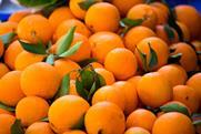 Ripe oranges in box Adobe Stock