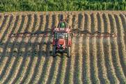 Spraying a potato field pesticide Adobe Stock