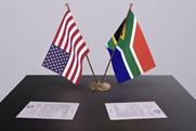 USA South Africa flags table agreement