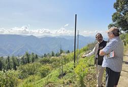 ) Apple Action Plan Project Manager Lachlan McKay with Dr Nvaeen Chand Sharma at Mashobra Research Station, Himachal Pradesh.