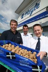 L-r: Simon Woodhams, from The Co-operative Farms, with grower Alan Mitchell, and Paul Westaway, who manages The Co-op's Hayle store