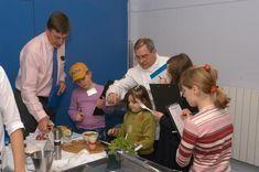 PVGA's Martin Riggall (left) with Peter Richards of  Westminster Kingsway College and  four primary school children judge the culinary efforts on show