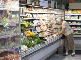Elderly old woman shopping
