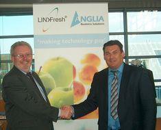 Priva's Chris Addis (left) and Anglia's Robert Frost shake hands on the agreement