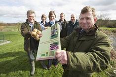 Left to Right: Branston grower and owner of Perrins Farm Jamie Pullen; Susan Turner of Tesco; Kate Jackson, British Potato Council; Peter Harkett, McCains; Nick Sheppard, Branston; and David Cliffe of FAWG.