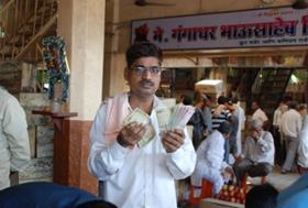 Indian fruit trader rupees