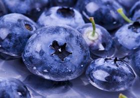 GEN close up of blueberries in water
